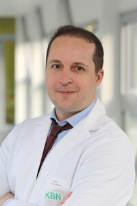 Porträtfoto von Dr. Radosa