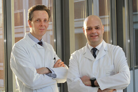 Porträtaufnahme von Prof. Naumann und Prof. Rustemeyer