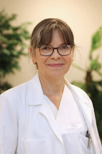 Portraitfoto Michaela Bütow in weißer Dienstkleidung