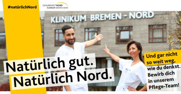 Zwei Mitarbeiter vor dem Haupteingang "Natürlich gut. Natürlich Nord"